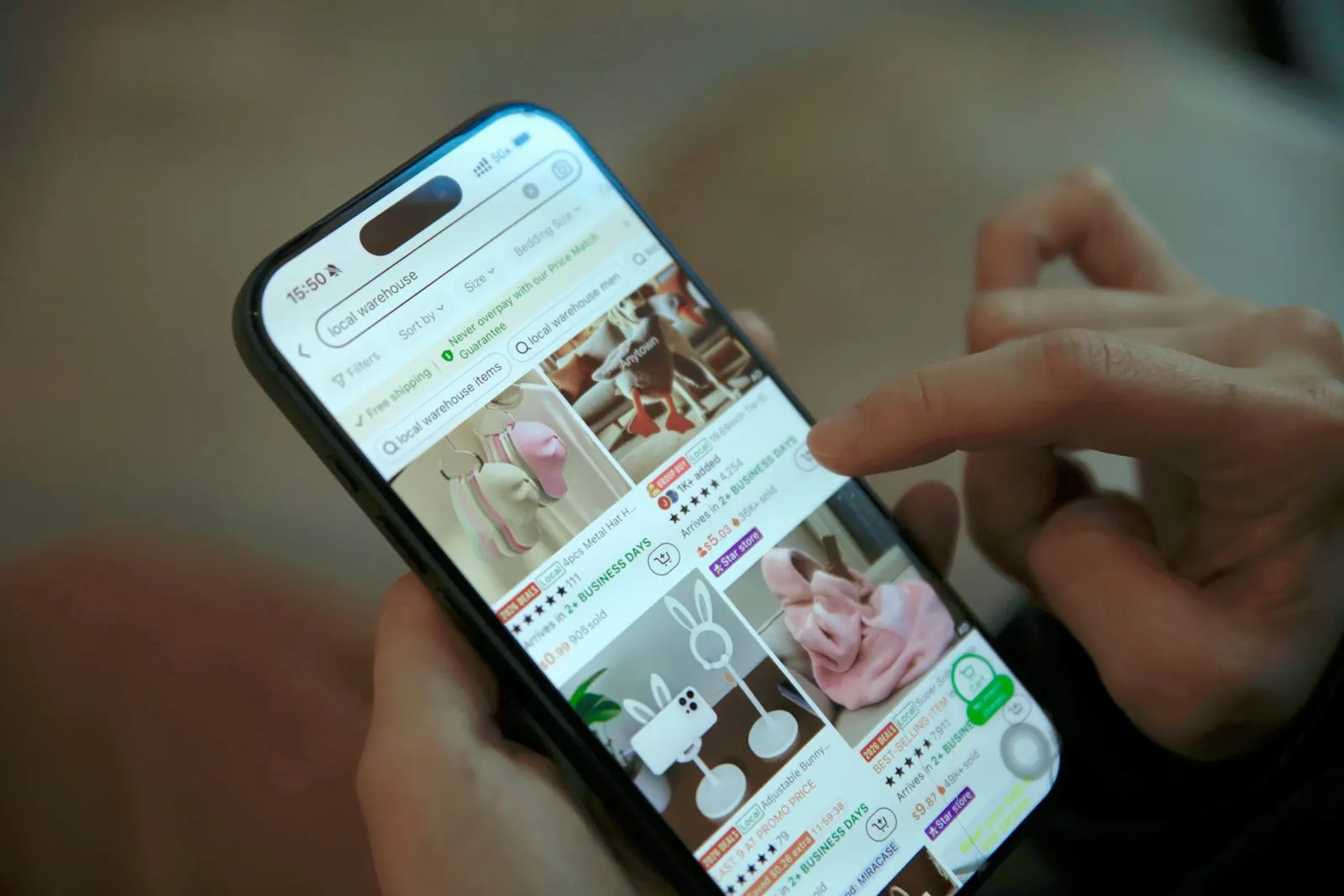 Person browsing an online store on a smartphone